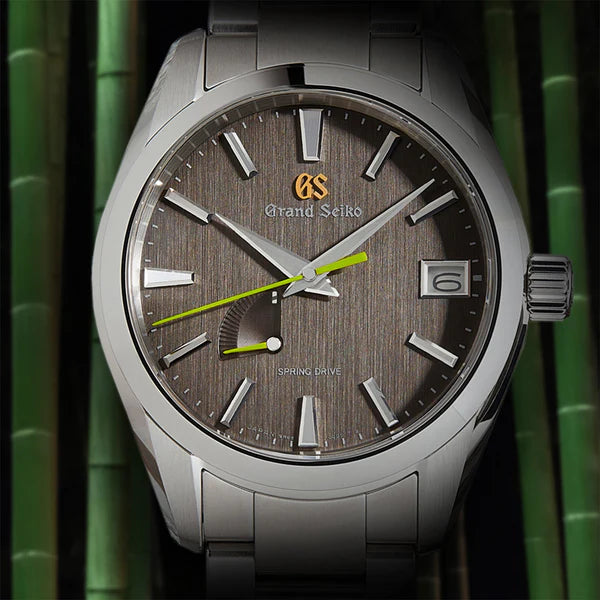 Grand Seiko SBGA429 'Soko Shadow' Spring Drive Watch  against a baboo background