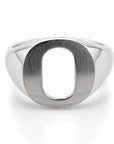 A silver signet ring featuring a large, open oval letter 'O' on a polished metal band, shown on a clean white background with a soft reflection.