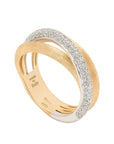 Gold and white gold diamond ring with 'made in Italy' engraving on a white background