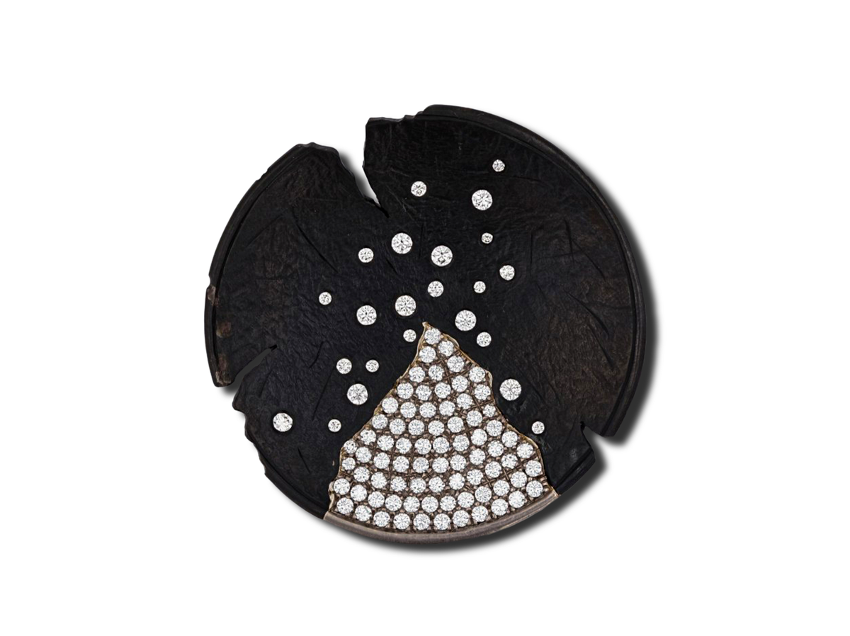 Logan James sculptural steel and 18K white gold brooch with 1.05ctw scattered and pavé diamonds on black circular design