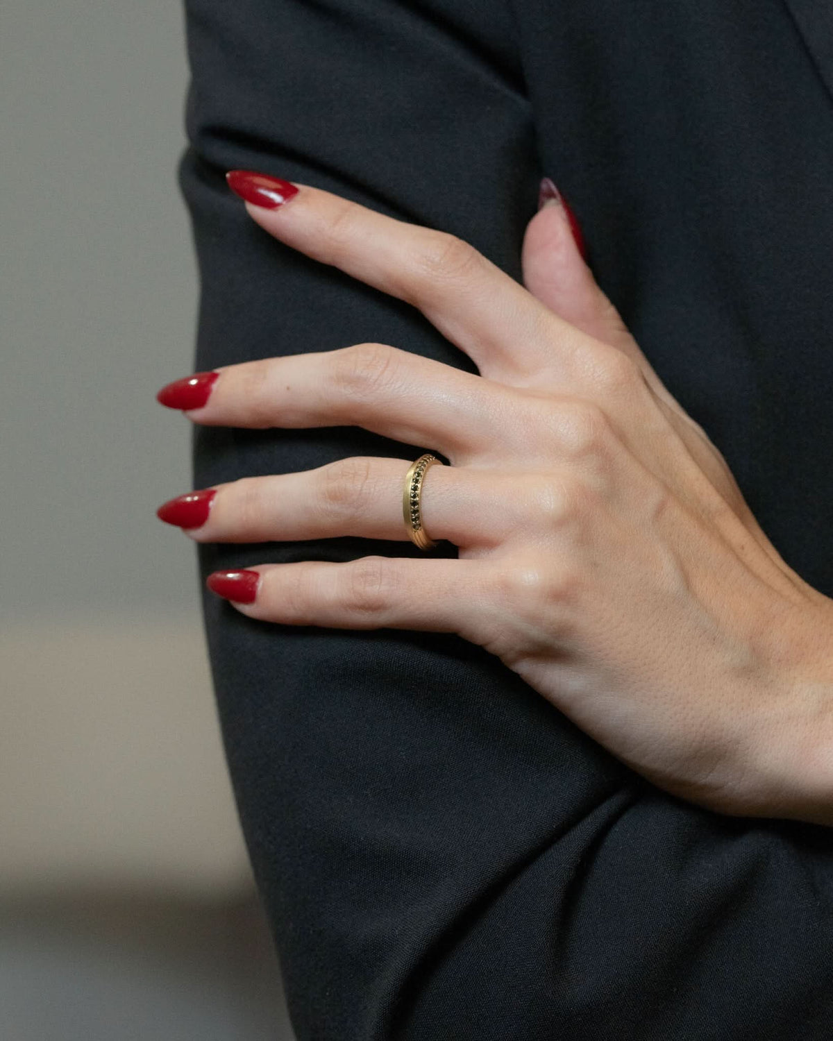Logan James Urban black diamond gold ring on model hand lifestyle view