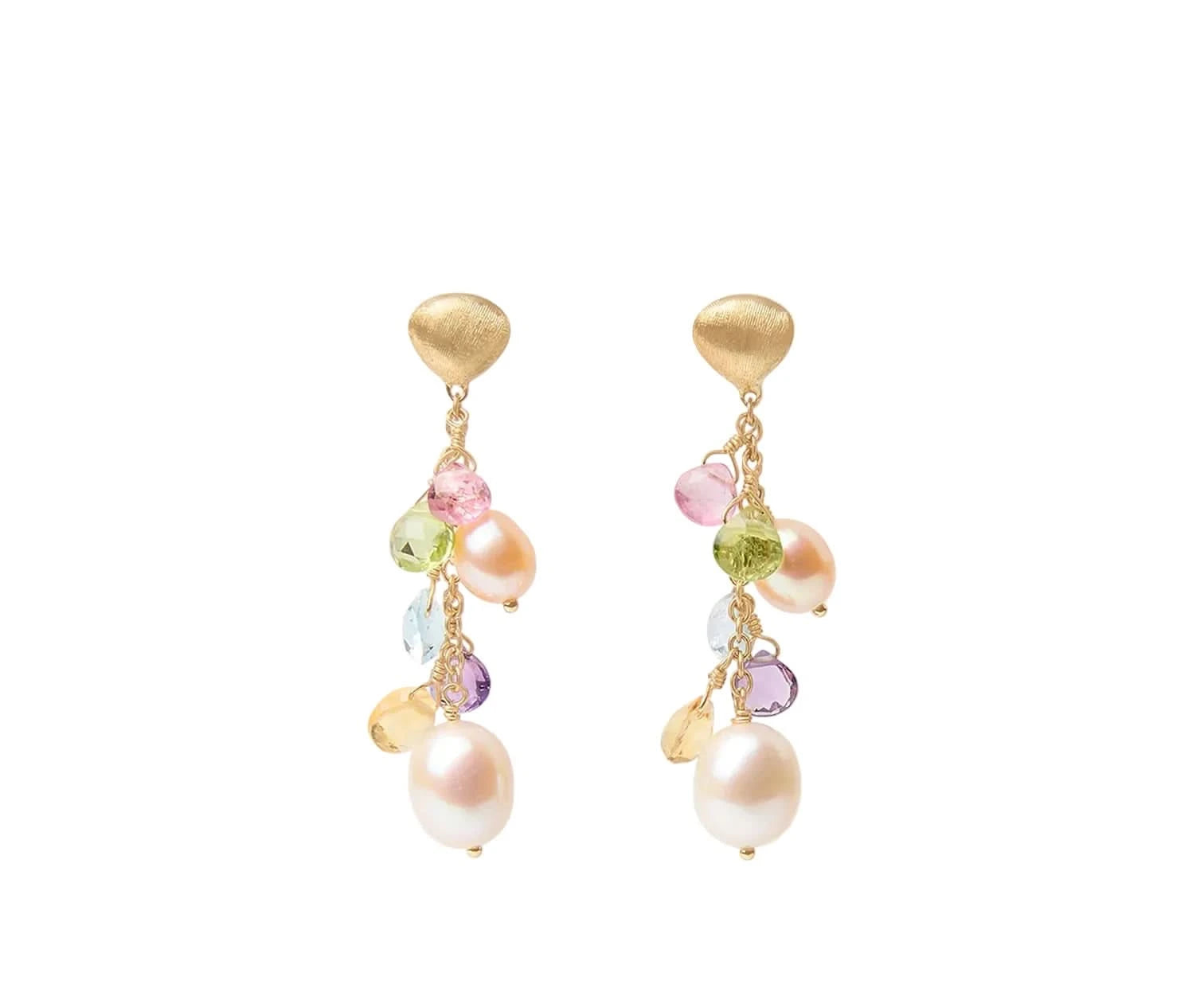 A pair of gold dangle earrings featuring a textured gold top, small multicolored faceted gemstones, and large white freshwater pearls hanging from gold chains, set against a light off-white background.