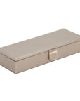 Beige jewelry box with a gold clasp on a white background side