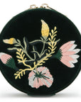 Round black velvet case with floral embroidery on a white background