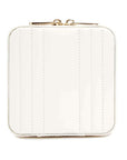 White quilted case with gold tone clasp on a white background