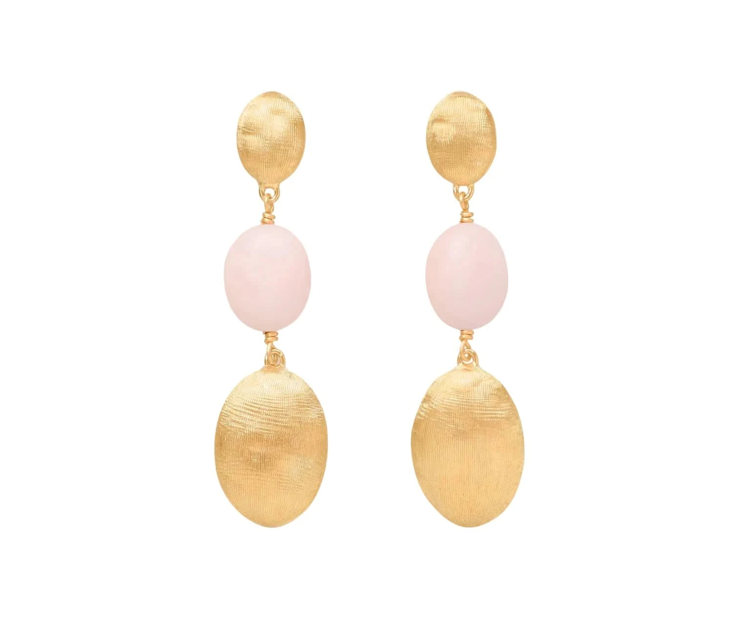 A pair of gold drop earrings featuring a textured round gold top, a smooth pale pink oval bead, and a larger textured gold oval drop, shown against a light off-white background.