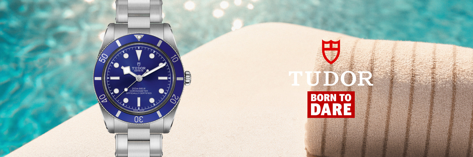 TUDOR Black Bay 58 with a blue dial and bezel beside a swimming pool.