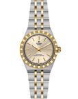 Two-tone silver and gold watch with Tudor logo open bracelet on a white background