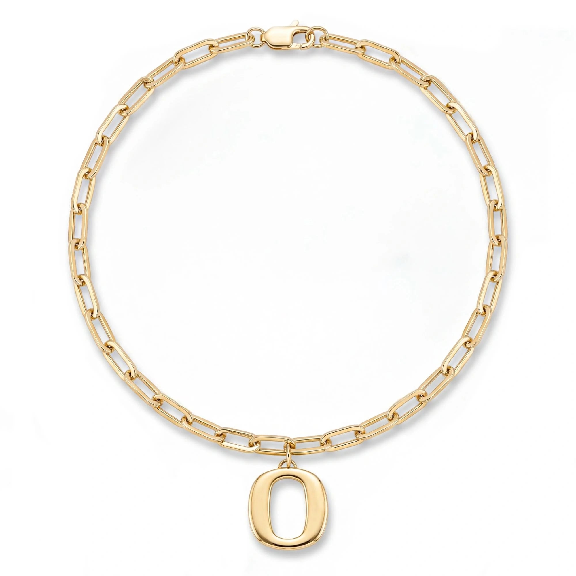 A gold paperclip chain necklace with a polished lowercase letter 'o' pendant, displayed on a clean white background.