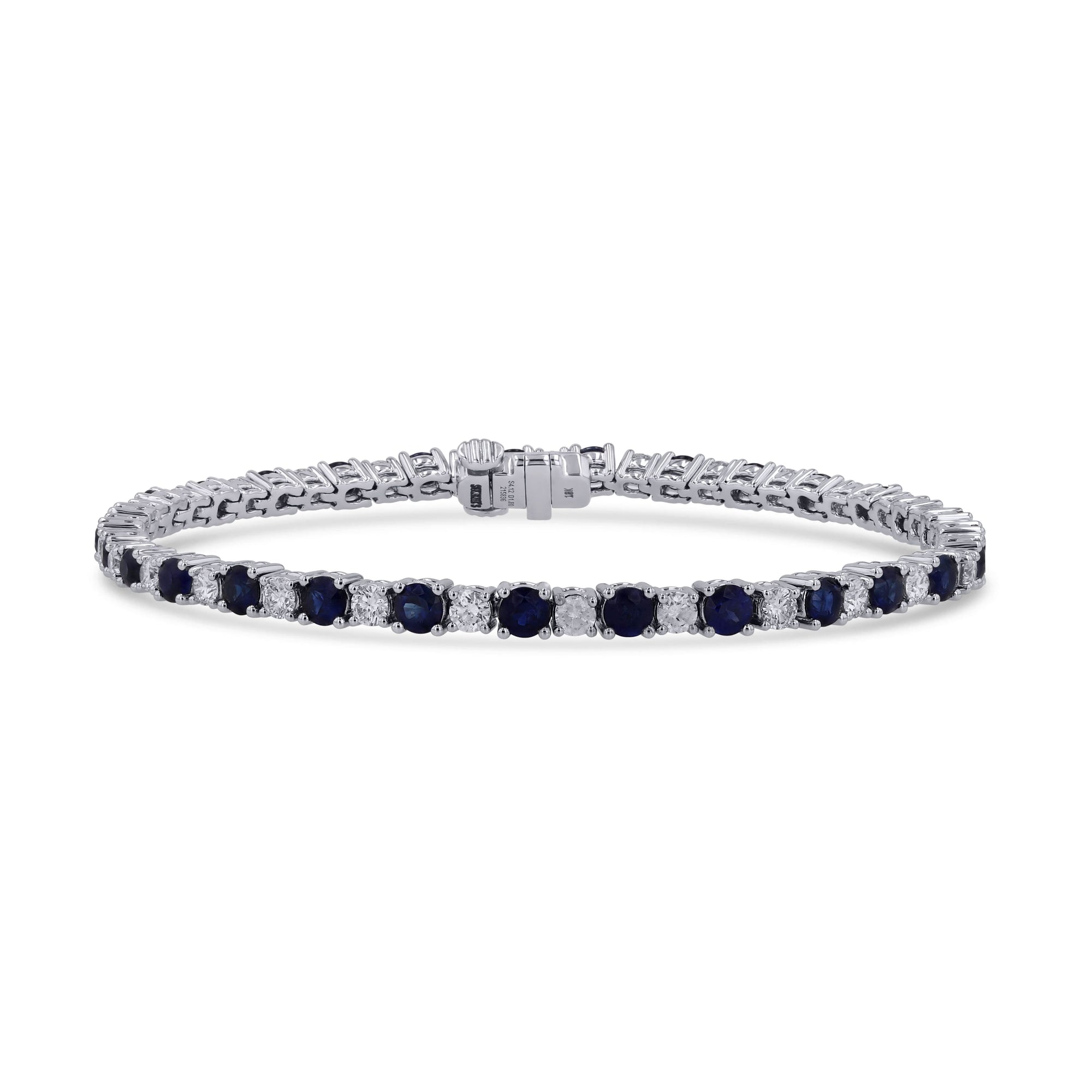 An 18k white gold tennis-style bracelet showcasing an alternating pattern of round blue sapphires and round brilliant diamonds in a shared prong setting, displayed horizontally on a white background