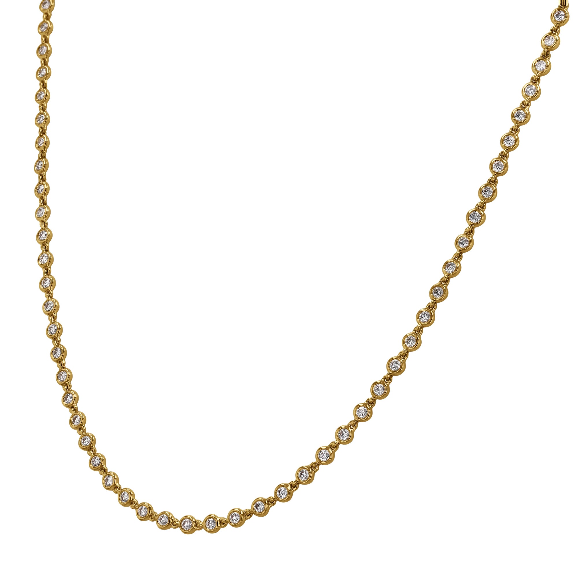 Gold necklace with embedded diamonds on a white background