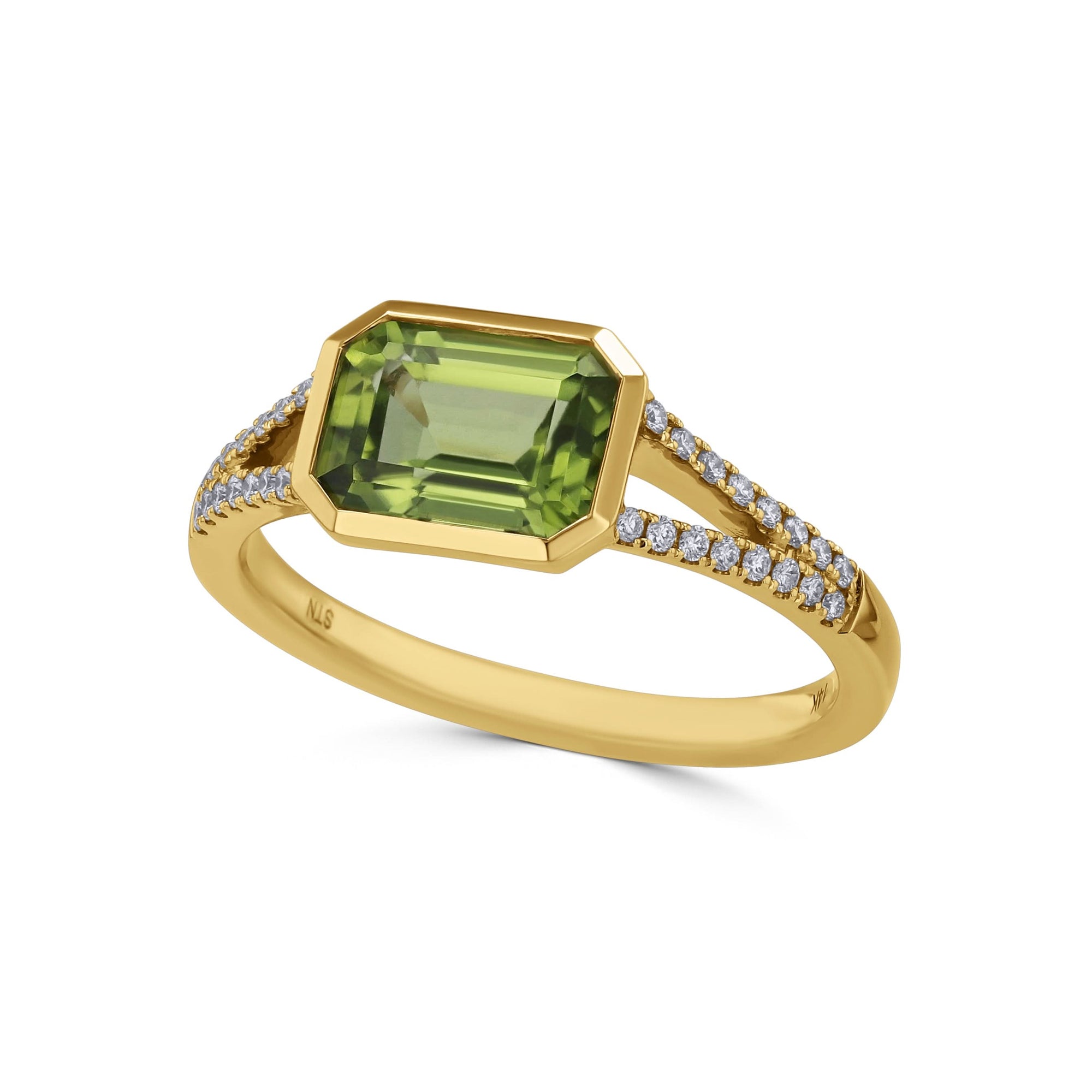 yellow gold ring with a green bezel center and embedded diamonds tilted view  on a white background 