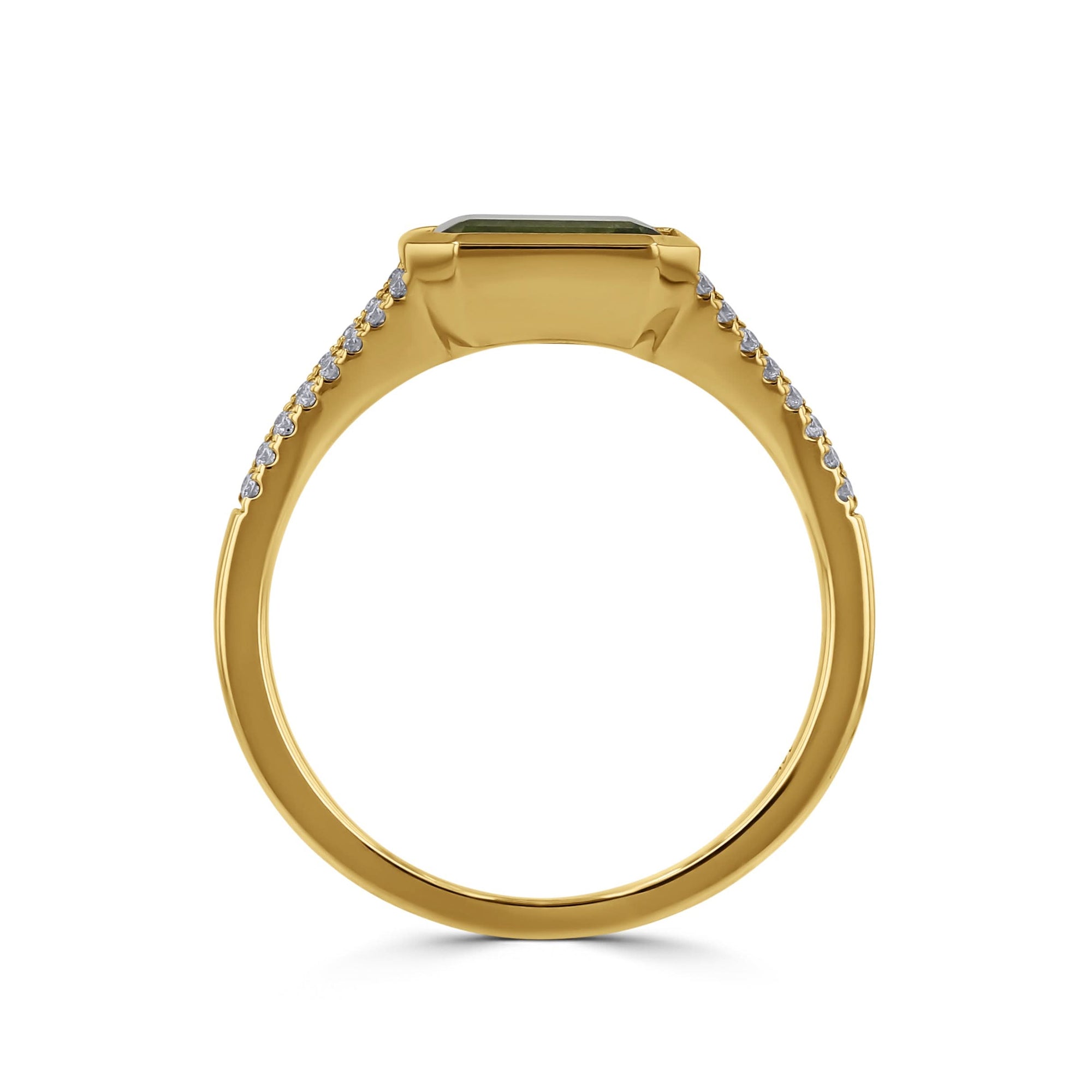 side of yellow gold ring with diamonds on a white background
