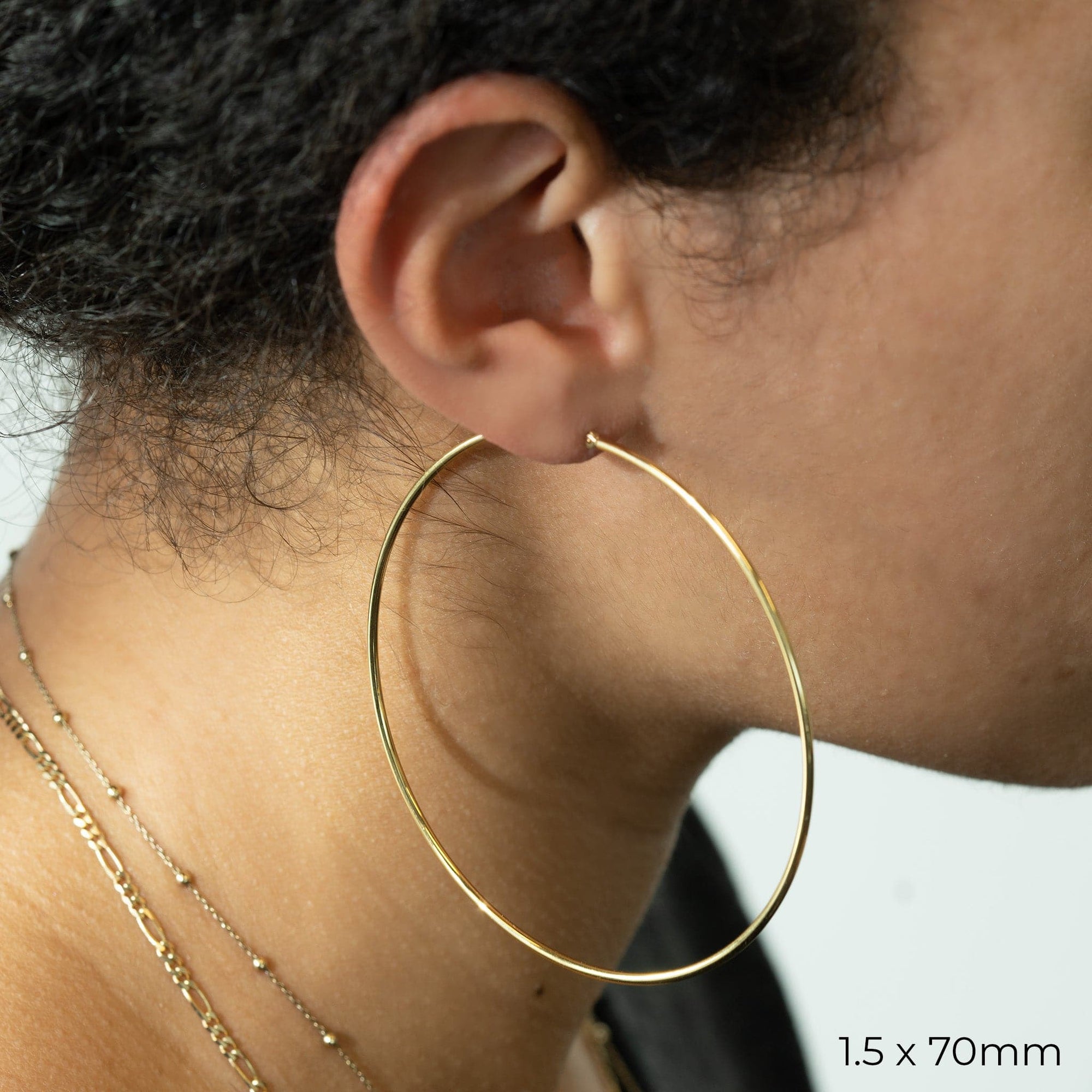 Yellow Gold Tube Hoop Earrings by Carla | Nancy B. 1.5x70mm Modeled