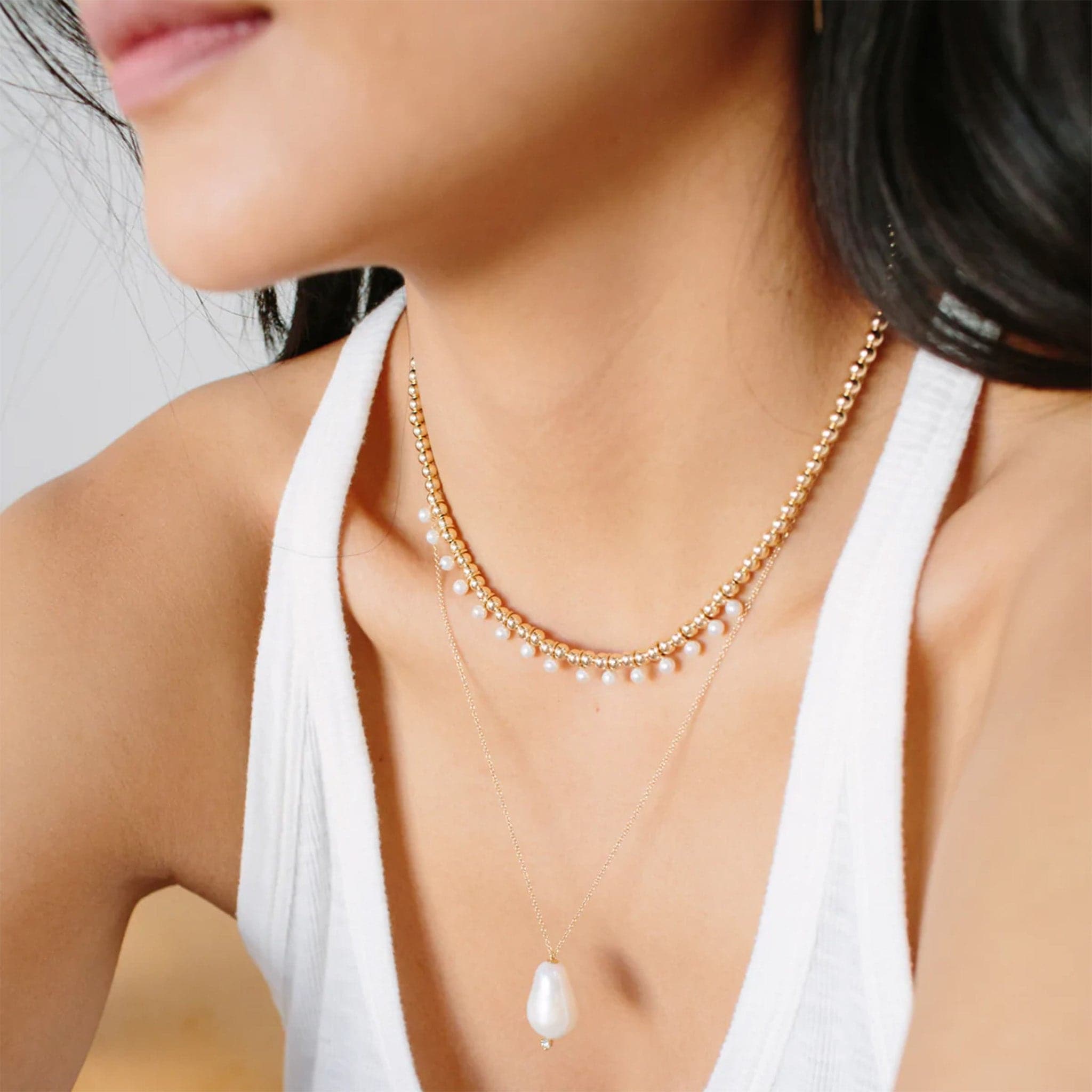 Five-strand white pearl necklace