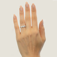 Three Stone Diamond Halo Engagement Ring in Platinum