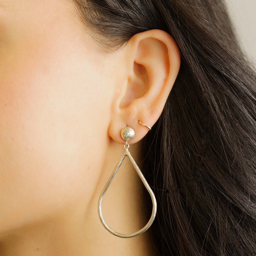 Sterling Silver Teardrop Hoop Earrings 'Janjen'  by Lika Behar Modeled