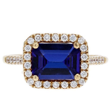 Kimberly Collins Emerald Cut Tanzanite with Diamond Halo Ring