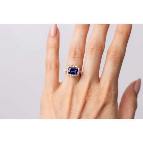 Kimberly Collins Emerald Cut Tanzanite with Diamond Halo Ring - Skeie's Jewelers