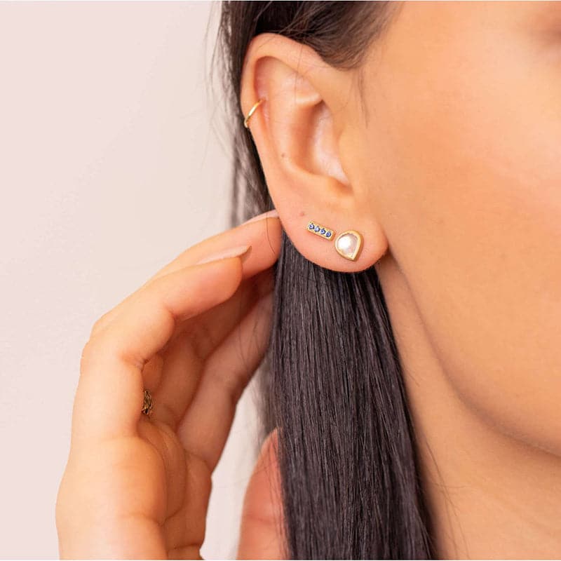 Kimberly Collins Pear Shaped Moonstone Earrings on ears