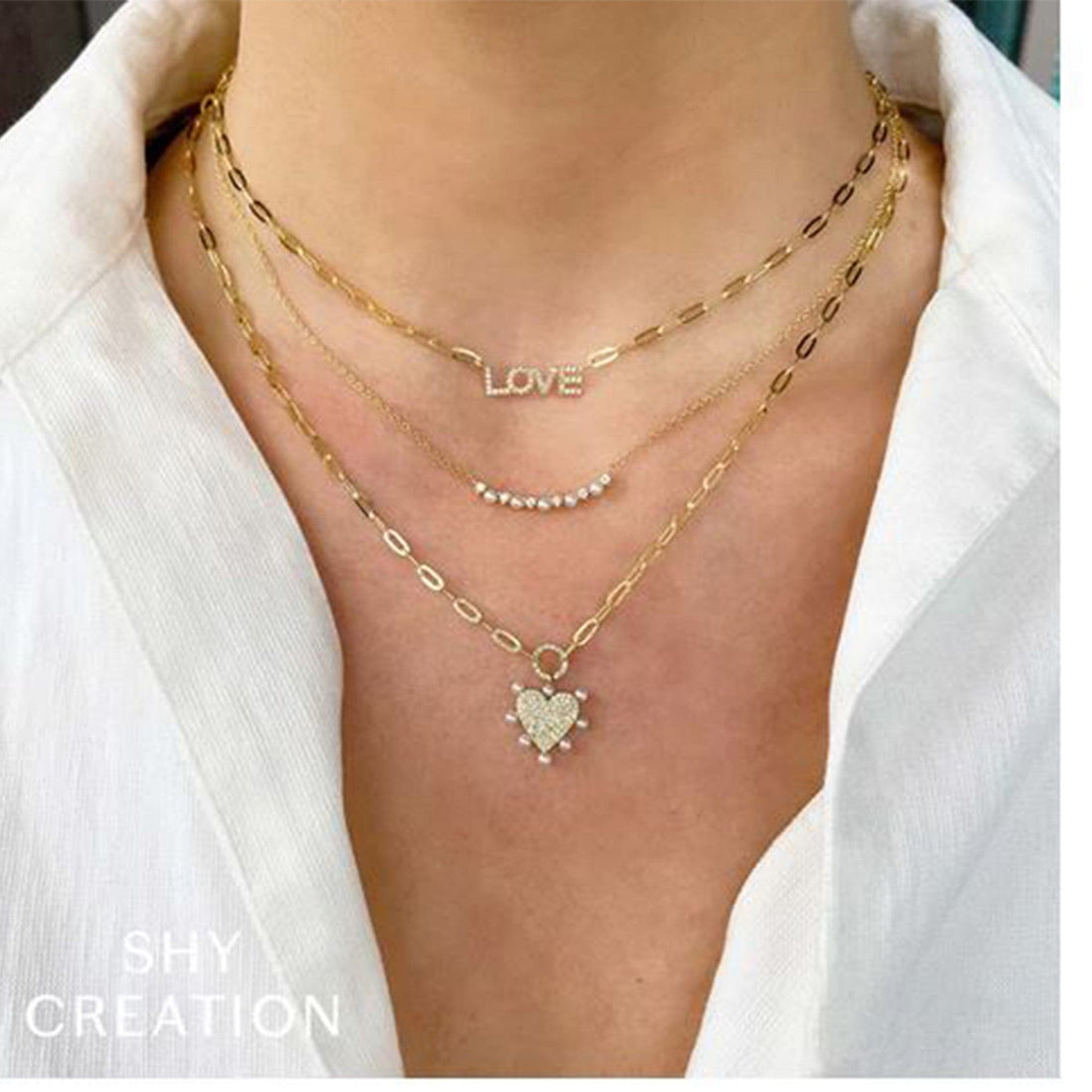 Yellow Gold Love Diamond Pendant Necklace by Shy Creation modeled